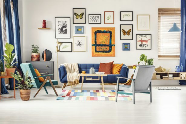 Simple posters gallery hanging on the wall in bright living room